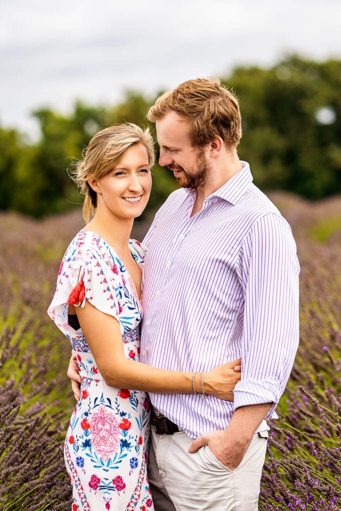 A beautiful pre wed picture taken in the picturesque Mayfield Lavender farm surrounded by stunning colours by Alex Buckland Photography