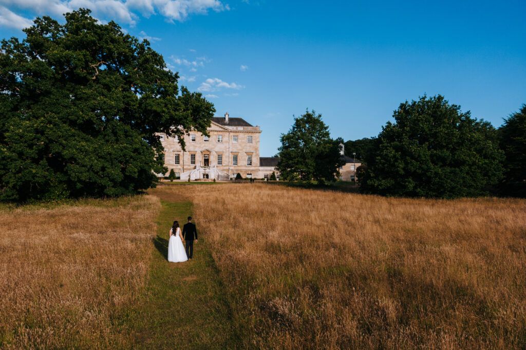A drone photo of a Bride and Groom at a wedding at Botleys Mansion | Alex Buckland Photography