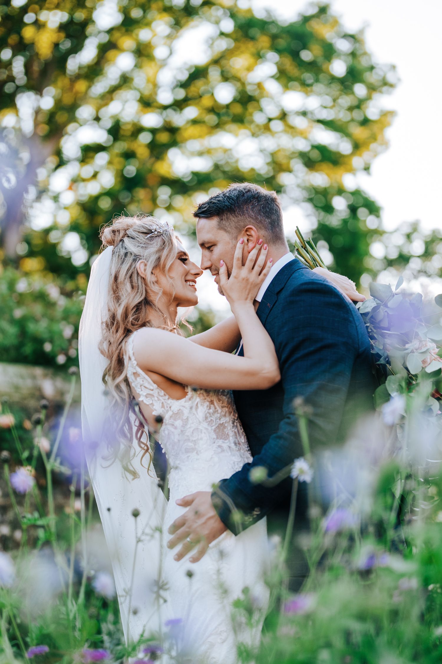 a couple pose in nymans NT captured by Sussex wedding photographer Alex Buckland