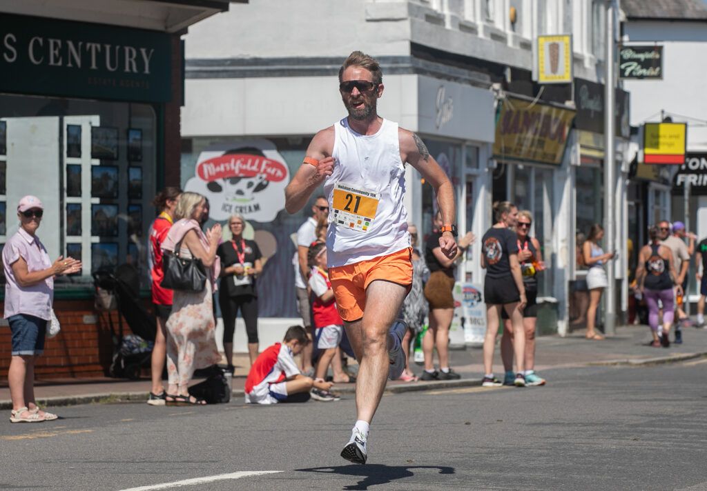 Alex Buckland running, Eastbourne wedding photographer